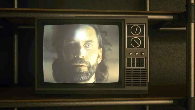 Alan Wake's face on the TV screen